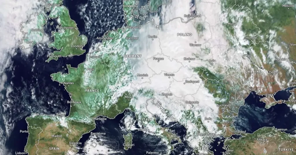 Satellite image of Western Europe with clouds dispersed across various regions. Cyclone Boris in Europe